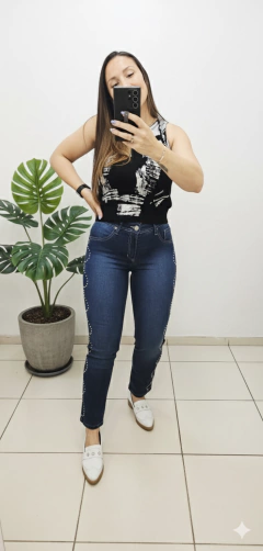 Jeans Tibet con tachas círculo