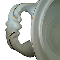 Adquira a Sopeira Antiga Schmidt 1963, uma peça única e sofisticada. Perfeita para servir sopas e caldos, e um destaque para sua decoração vintage.