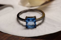 ANEL RODIO NEGRO COM PEDRA AZUL - comprar online