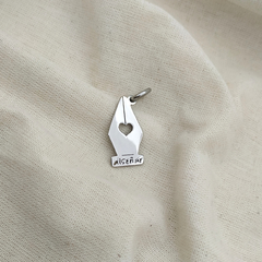 Dije pluma diseñador