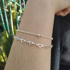 Pulsera doble corazones y bolitas acero blanco