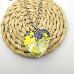 Dije Corazón Cristal Tornasol (No incluye cadena) en internet