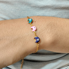 Pulsera lunitas con ojitos esmaltados acero dorado - comprar online