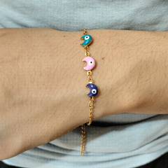 Pulsera lunitas con ojitos esmaltados acero dorado