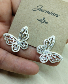 Aros Mariposa brillante acero blanco en internet