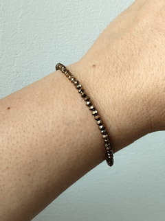 Pulsera de cristales dorada