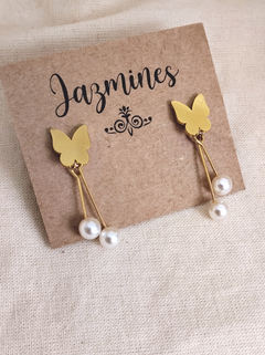 Aros mariposa con perlas acero dorado