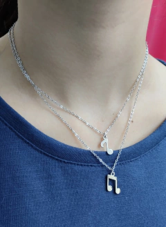 Collar doble notas musicales