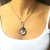 Conjunto con dije ovalado