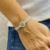 Pulsera Tejida San Benito Nácar