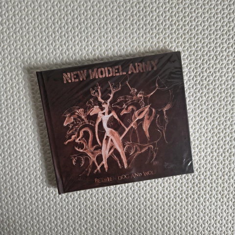 New Model Army – Between Dog And Wolf CD Digipack Lacrado - comprar online