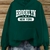 Imagem do Blusa Feminina Casual Brooklyn NYC Capuz e Bolso ElaShopp