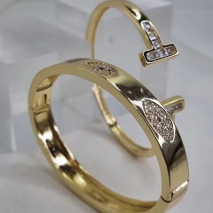 PULSERA ESCLAVA ACERO DORADO CON OJOS TURCOS K2507 - tienda online
