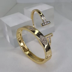 PULSERA ESCLAVA ACERO DORADO CON OJOS TURCOS K2507 en internet