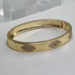 PULSERA ESCLAVA ACERO DORADO CON OJOS TURCOS K2507 - comprar online