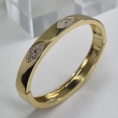 PULSERA ESCLAVA ACERO DORADO CON OJOS TURCOS K2507