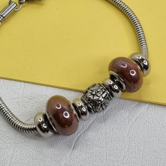 PULSERA DE ACERO QUIRÚRGICO, ESTILO PANDO CON DONAS 5967 - comprar online