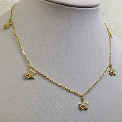 CADENA DE PLATA DORADA CON ESTRELLAS