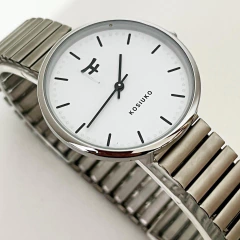 RELOJ ELASTIZADO KOSIUKO ELASTIZADO FONDO BLANCO cod: 7774.418
