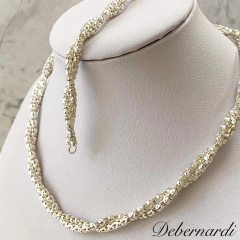 CONJUNTO GARGANTILLA Y PULSERA TEJIDA EN PLATA.