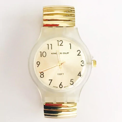 RELOJ KNOCK OUT ELASTIZADO ACERO DORADO K02405