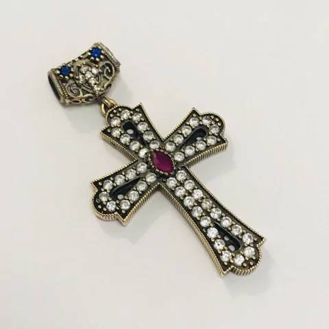 CRUZ TURQUIA CHICA DE PLATA CON CENTRO RUBI COD: 3102