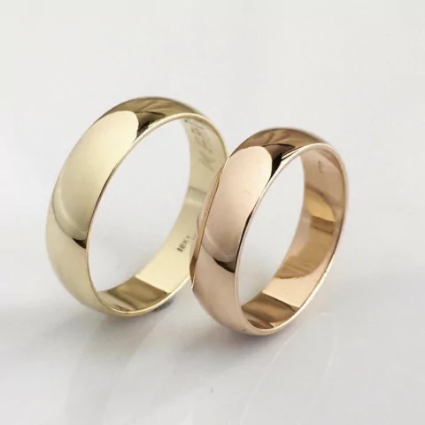 PAR DE ALIANZAS 10 Gs . ORO 18 K CON GRABADO