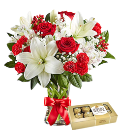 arreglo floral bouquet de lilium lirios y rosas rojas con florero de regalo y bombones