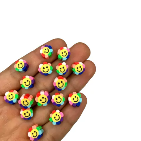 MIÇANGA (fimo) - FLOR COM CARINHA PÉTALAS COLORIDAS 10mm - 30 unidades