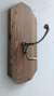 Perchero bronce y pinotea 46 x 20 cm