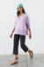 Sweater over V lila en internet