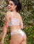 CONJUNTO CROPPED COM ZIPER E TIRAS NAS COSTAS BRANCO