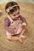 Beba con jumper Vencejo rosa y body Cauquén malbec