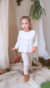 Nena con calza Hechizo color beige y blusa Ambar  color off white. 