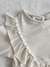 Detalle de la puntilla y volado del vestido Haitises