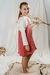 Nena con Jumper Yunga granate y remera Sagano off white
