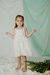 Nena con vestido Magnolia off white, de gasa de algodon estampado