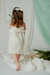 Nena con vestido Nacar, rayado con lurex, y detalle de broderie en pechera