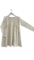Foto producto de vestido de nena de jersey estampado offwhite con volados en los hombros. 