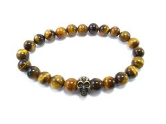Pulseira Caveira Olho de Tigre Gold na internet