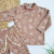 Conjunto Dinos y Palmeras Chocolate - comprar online