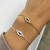 PULSER EYE SHINE DE ACERO DORADO en internet