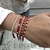 PULSERA BOLITAS CRISTAL RED UNA Y UNA DE ACERO BLANCO en internet
