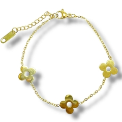 PULSERA FLOR TIF DE ACERO DORADO - comprar online