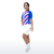 Modelo feminina usando a camisa de ciclismo Sport Marcio May Diagonal, com detalhes em azul e rosa, combinada com bermuda branca, em promoção!