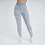 Calça legging feminina cinza mescla da marca Marcio May, ideal para atividades físicas, com design moderno e confortável.
