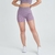 Shorts femininos rosa mescla, modelo Marcio May Sports, ideal para atividades físicas.