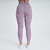Calça legging feminina rosa mescla vista traseira, ideal para atividades de fitness.