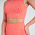 Top feminino laranja da marca Marcio May, modelo Romilla, com detalhes texturizados e ajuste confortável.