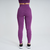 Calça legging feminina na cor uva, vista de trás, ideal para atividades físicas.